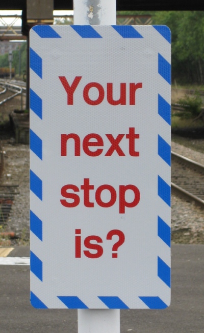 Station reminder sign at Bolton